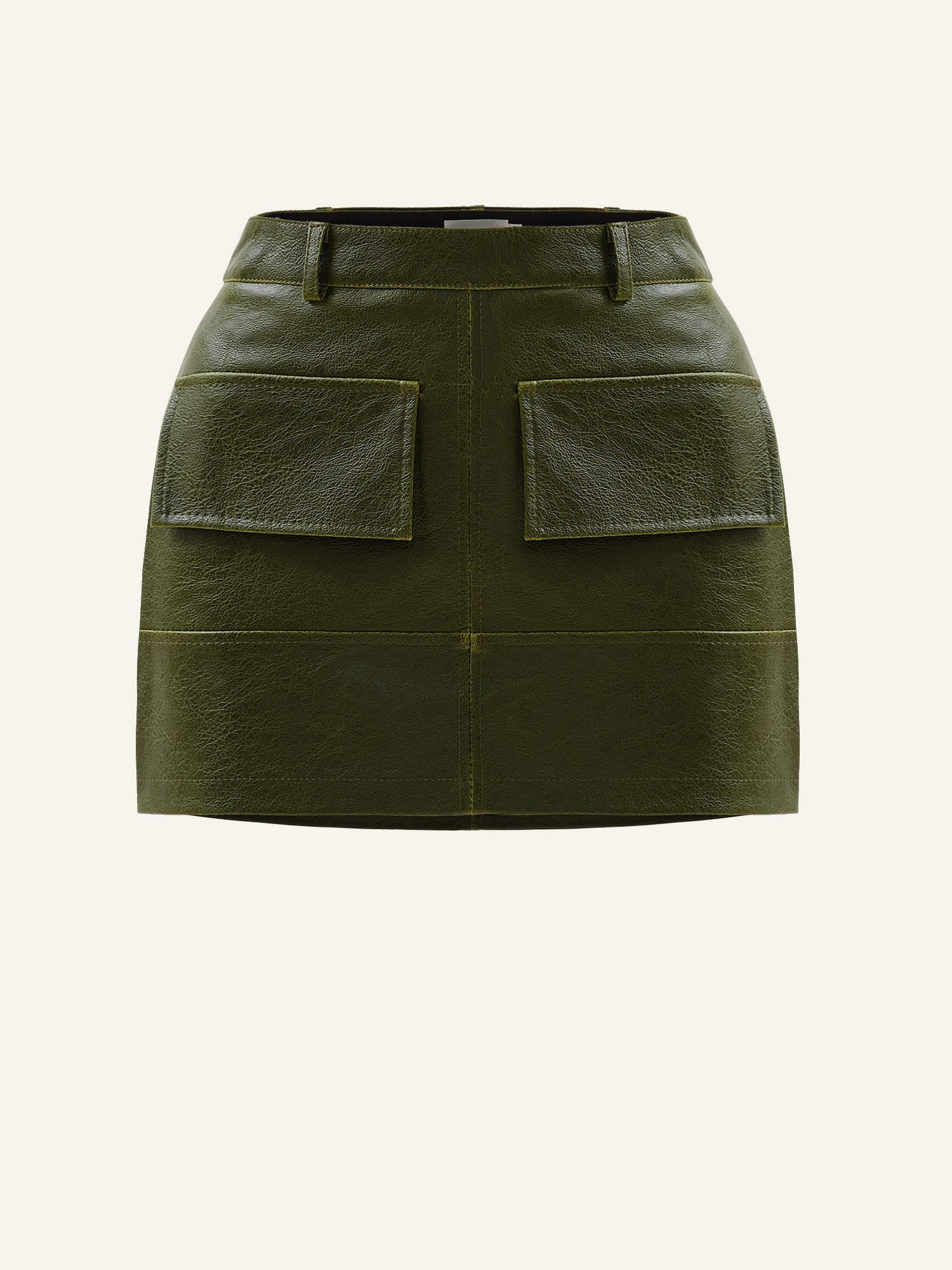 Product photo of a green vegan leather high rise skort with decorative pockets