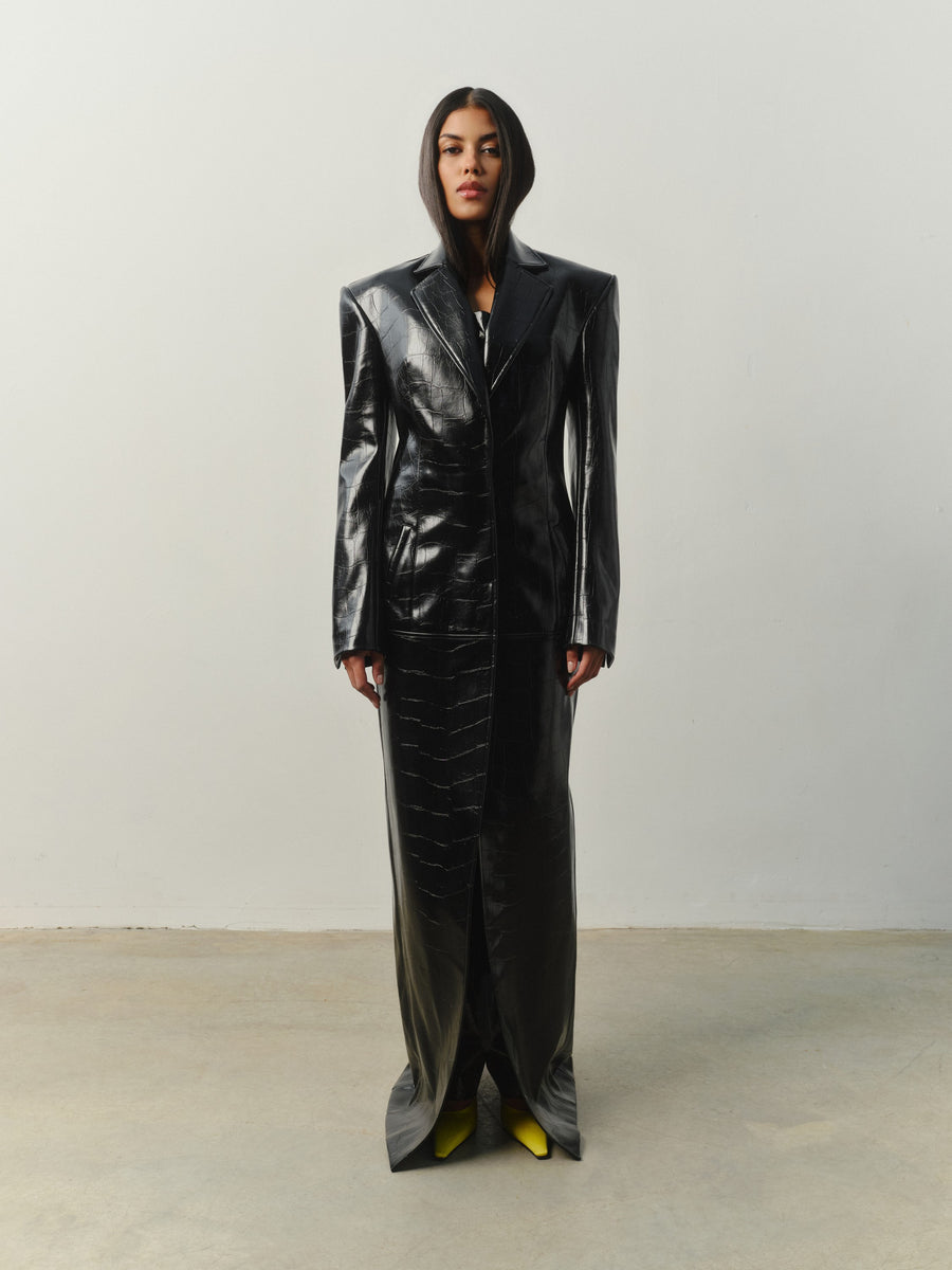 Her coat in Jumbo Croc