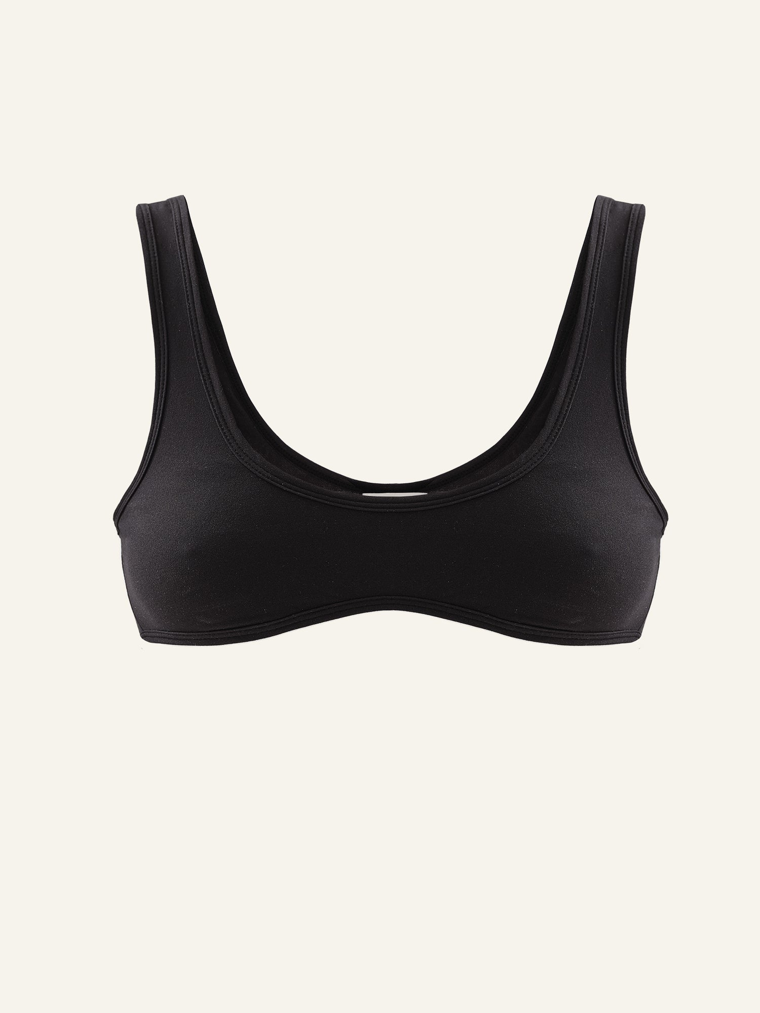 Product photo of a black regenerated nylon crop top