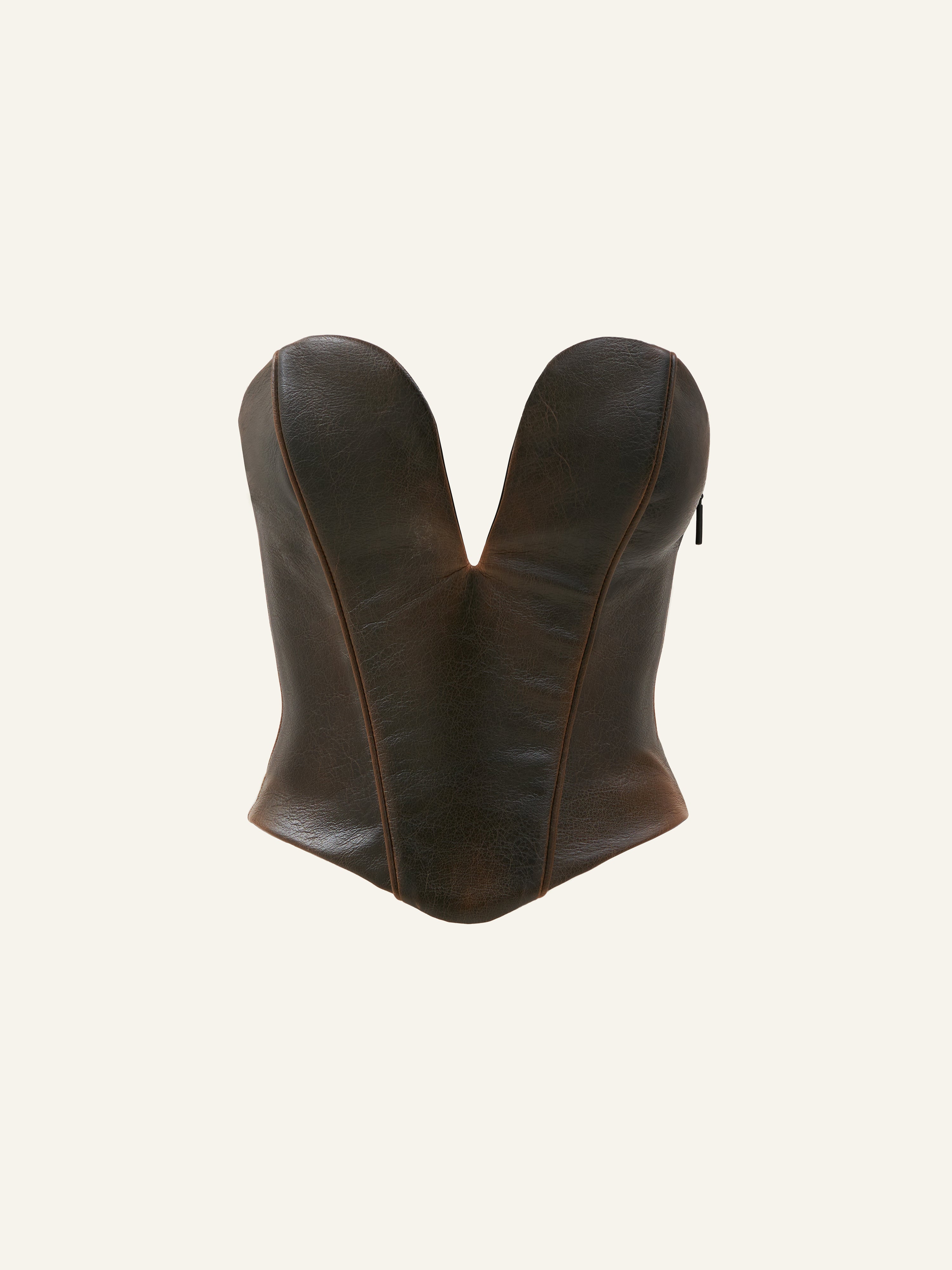 Product photo of a brown vegan leather tube top with deep v neck